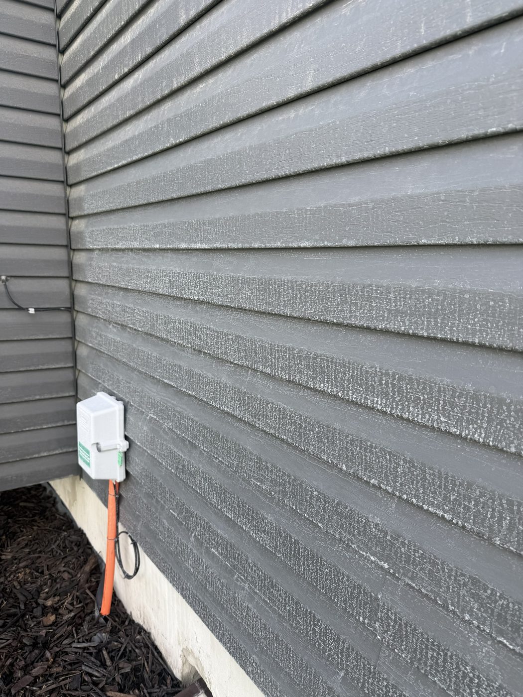 Before - hard water stains on siding