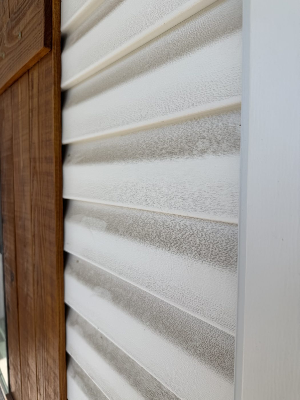 Before - dirty vinyl siding