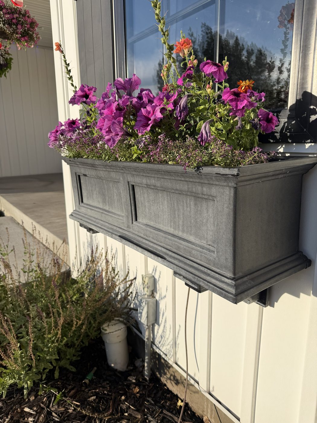 Before - hard water stains on planter box